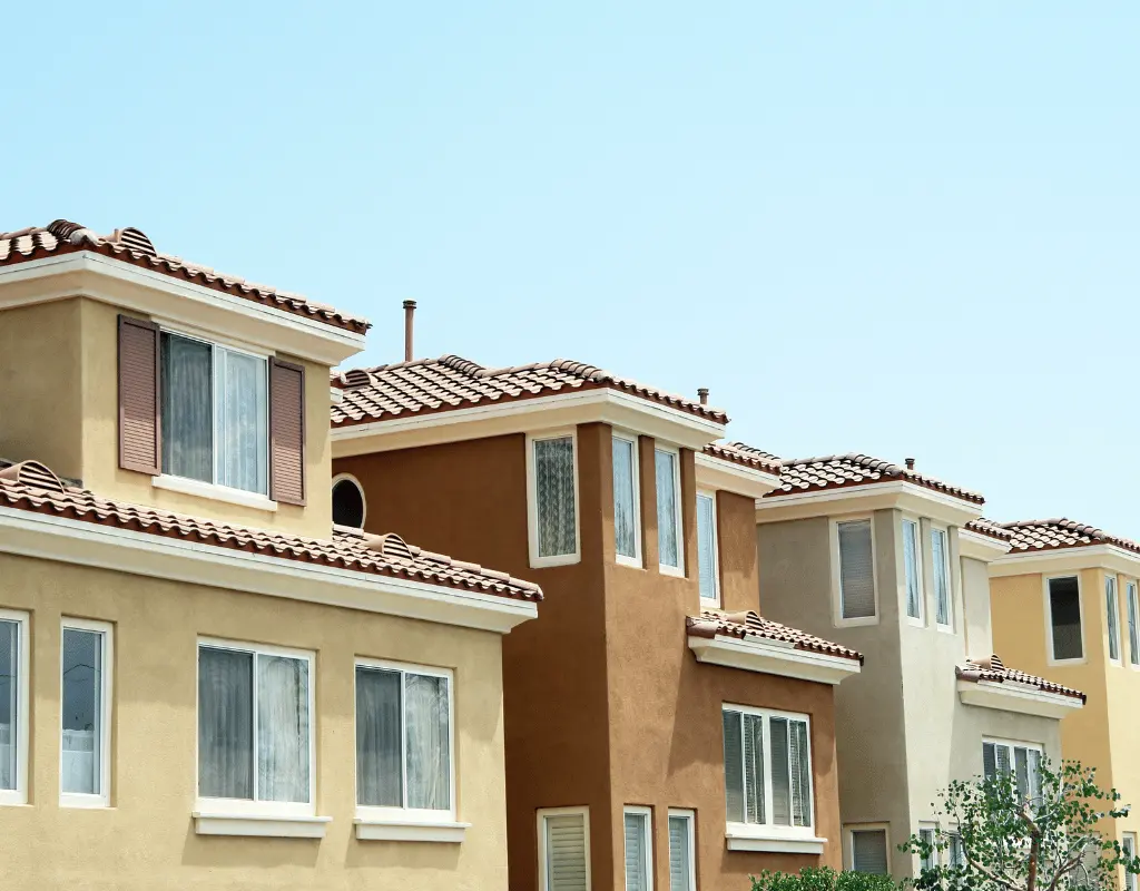 Row of Mediterranean-style stucco townhomes and condominiums served by a building engineer in Columbus, OH